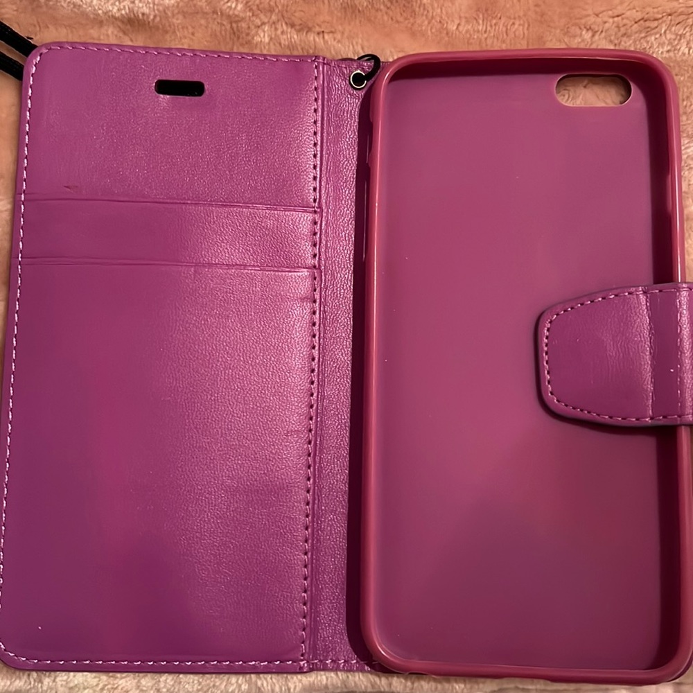 this is also a magnetic case. Credit card holders inside. Purple in color.